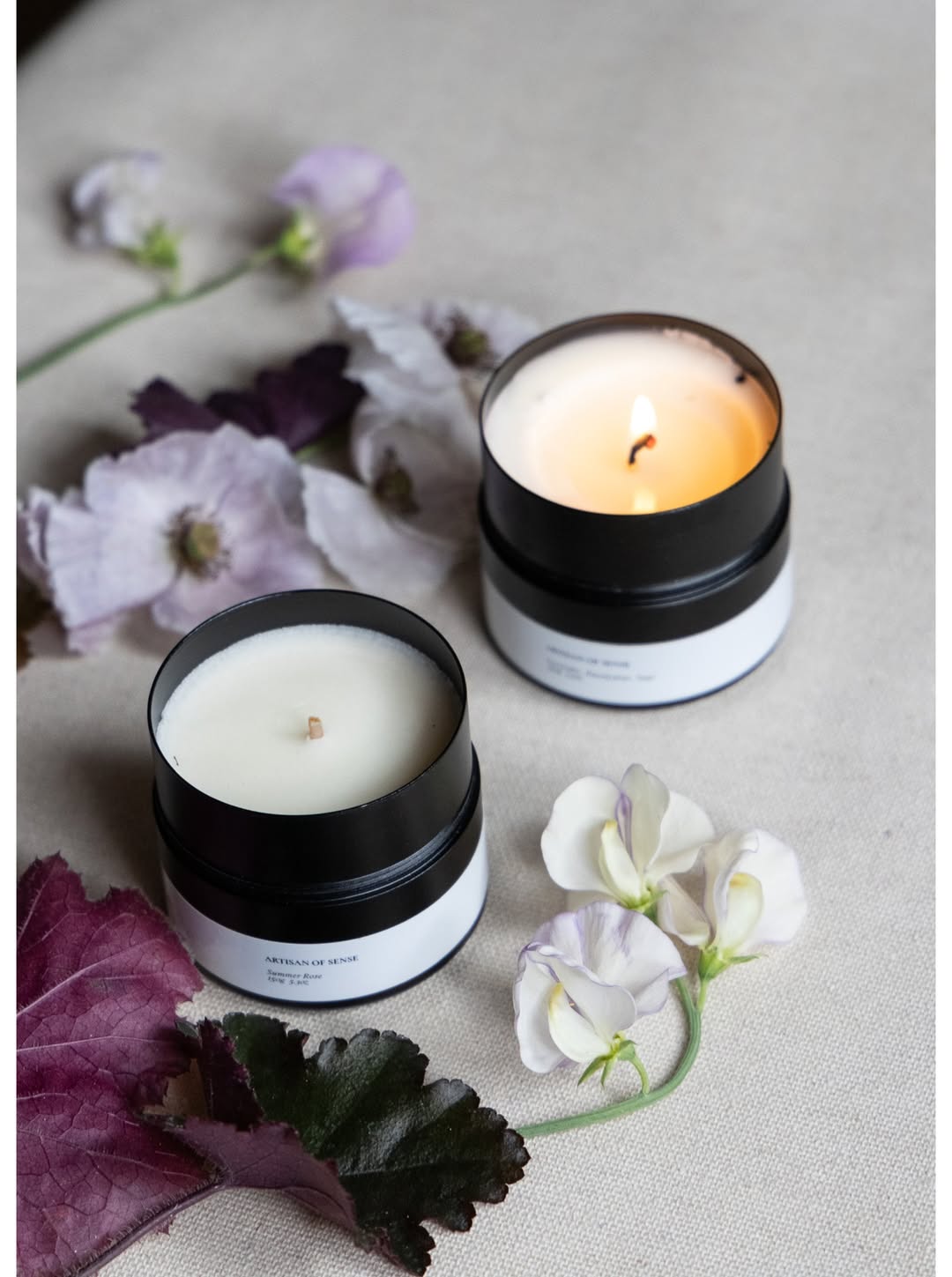 Scented candles in tins