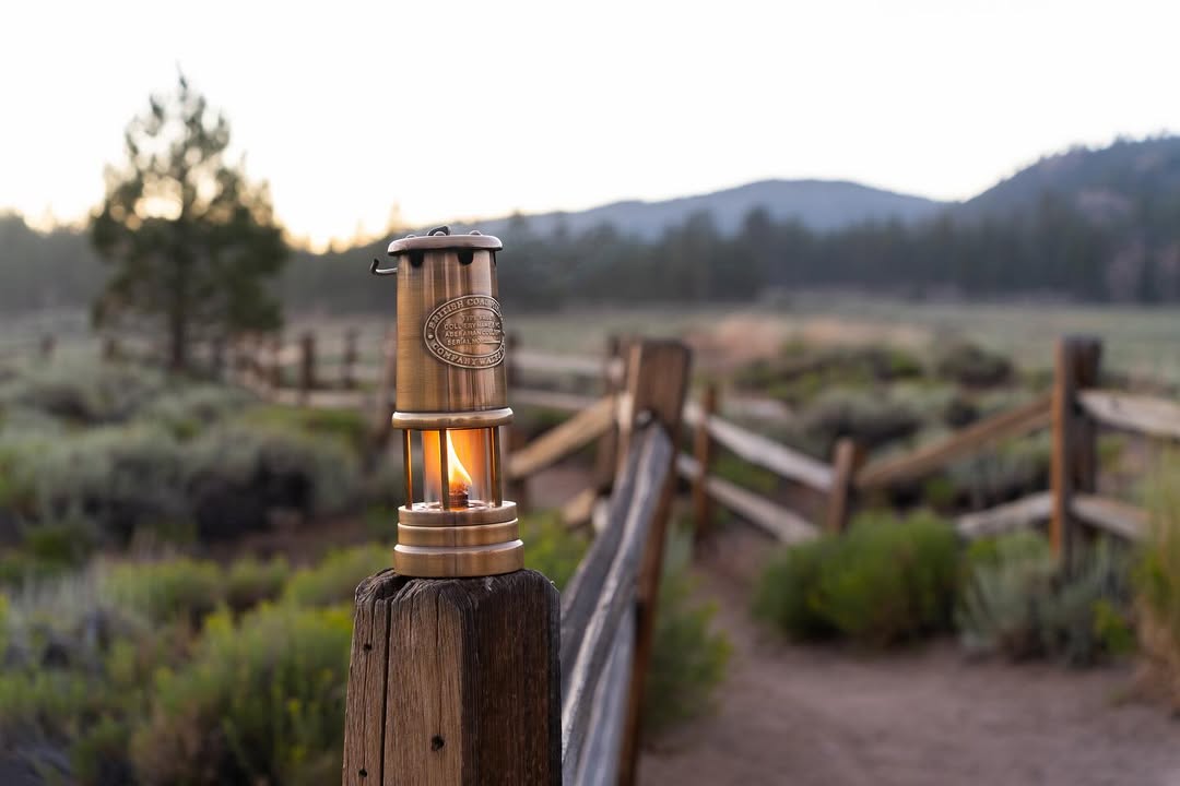 Brass oil lamps at entrance