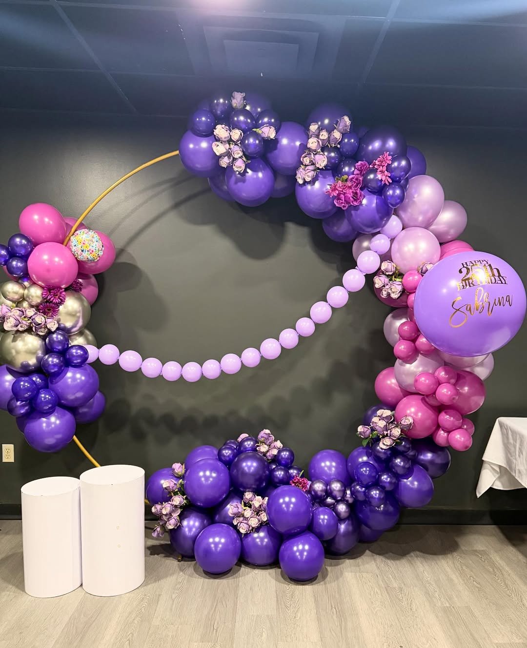 Pink and purple balloon garlands