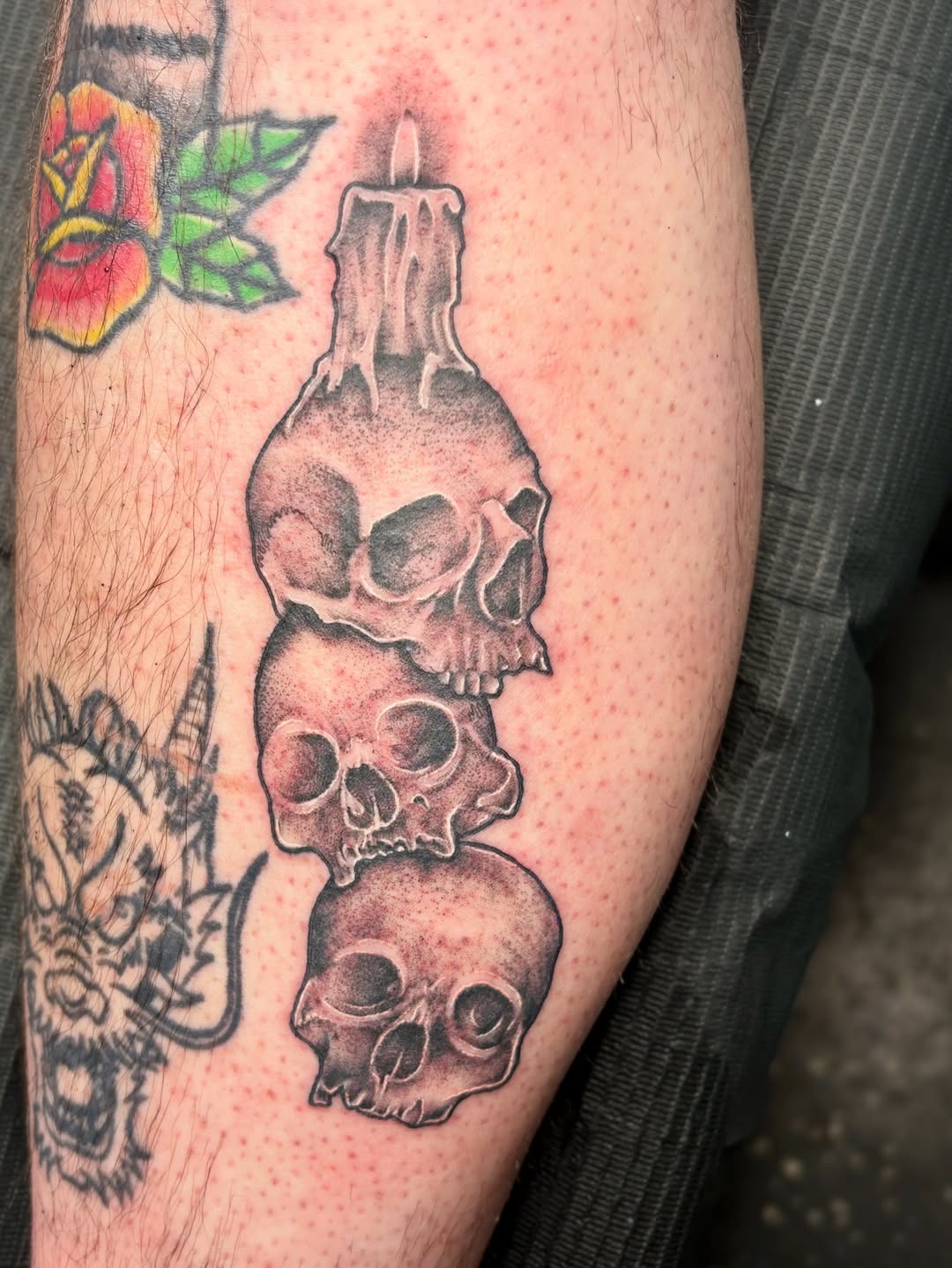 Skull with Candle and Flowers