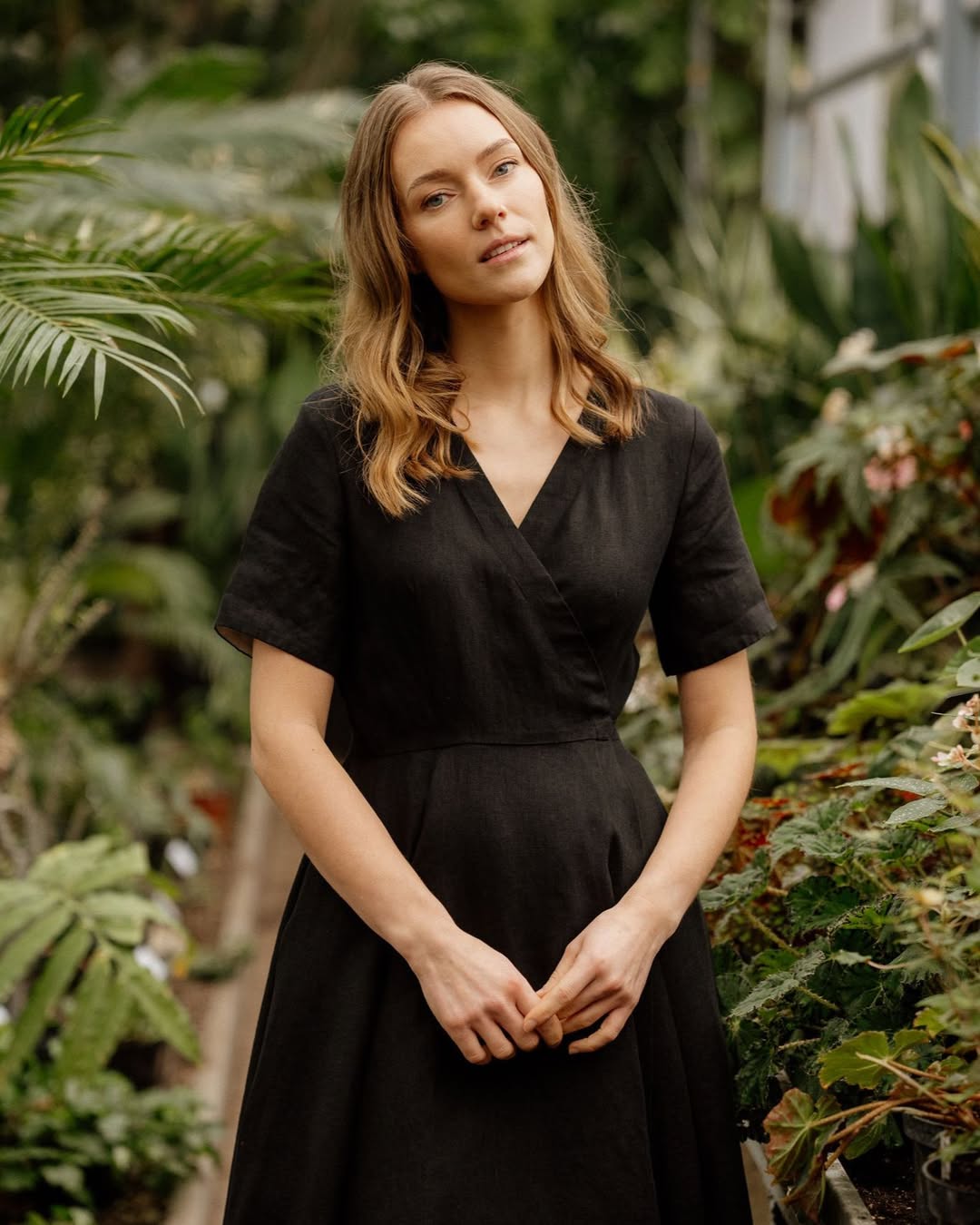 Wrap dress with minimal jewelry